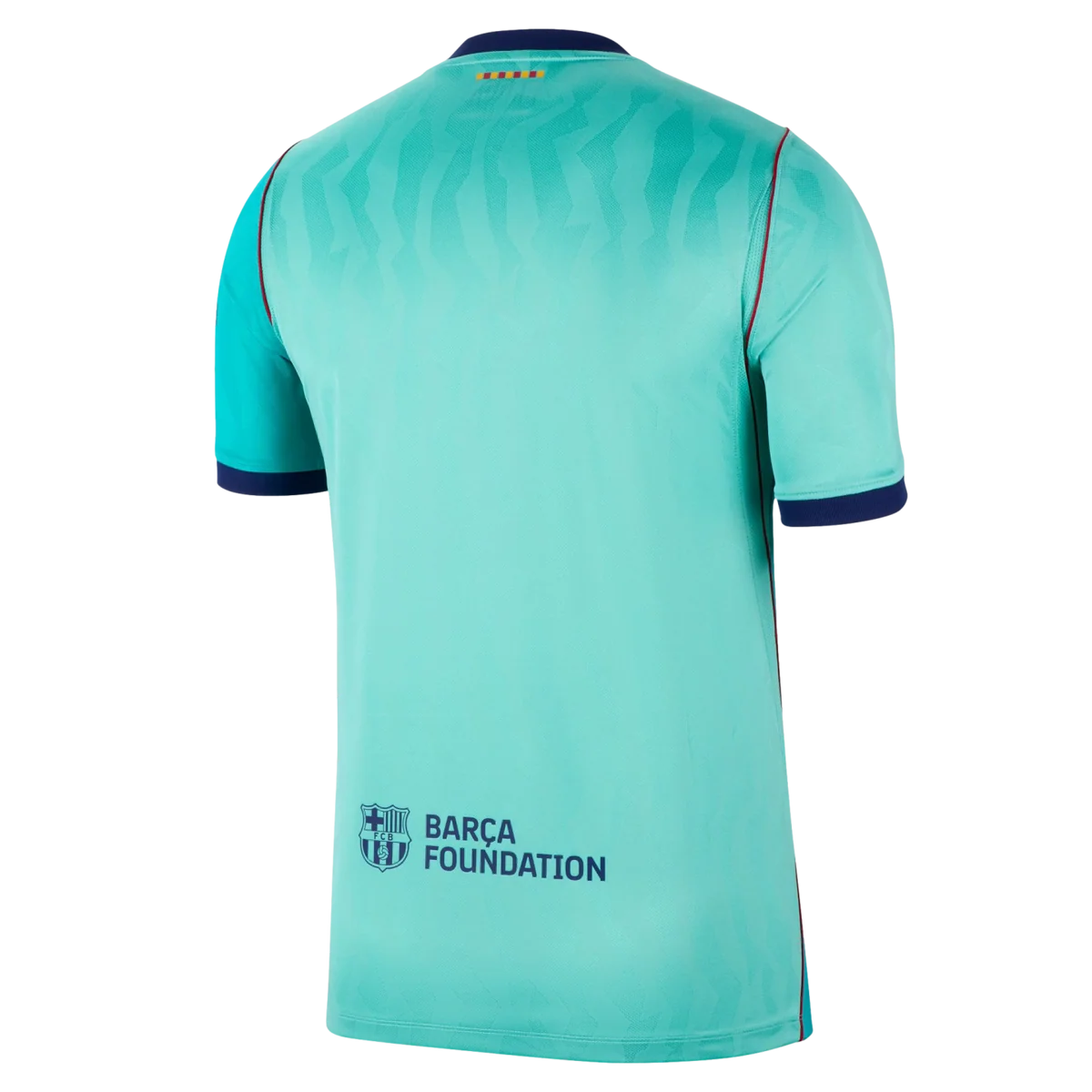 The back of a short-sleeve soccer jersey in a light turquoise/aqua color, featuring a subtle wavy pattern across the upper back, dark navy blue collar and sleeve cuffs, and the 'BARCA FOUNDATION' logo on the lower back.