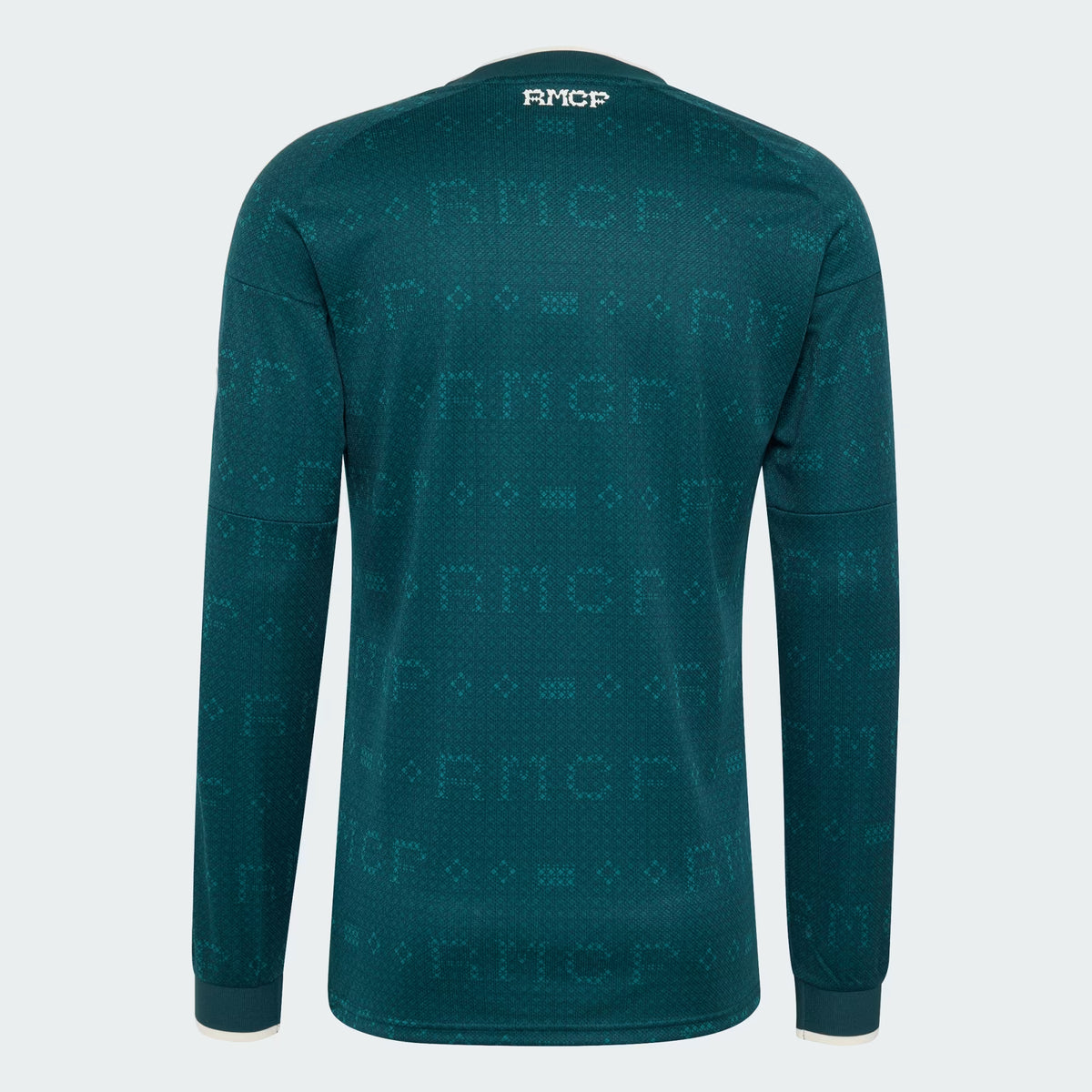 A dark teal long-sleeve athletic shirt with an all-over tonal RMCF logo pattern, shown from the back on a white background.