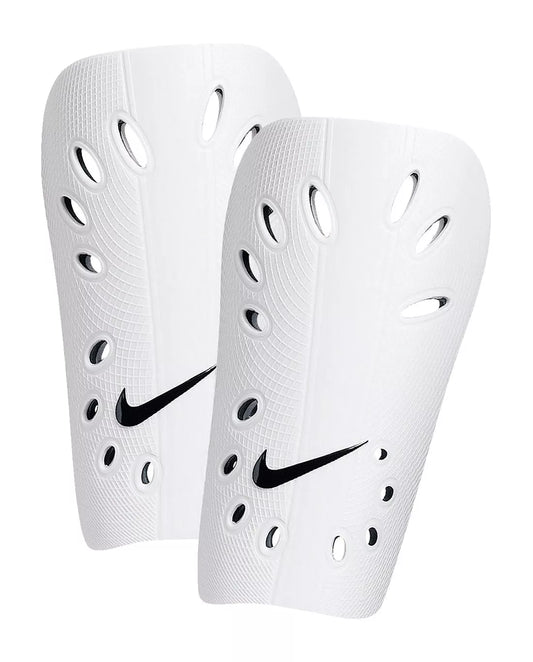 Pair of white shin guards with Nike logo on a white background