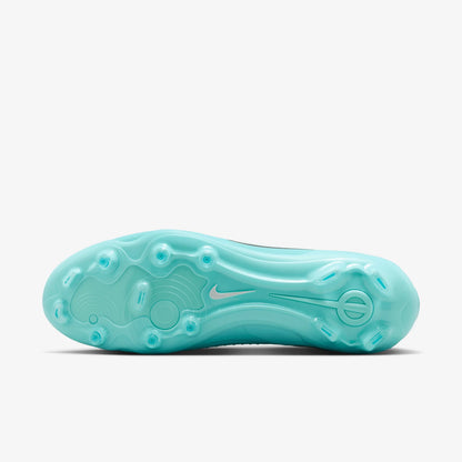 Turquoise shoe sole with Nike logo on a white background