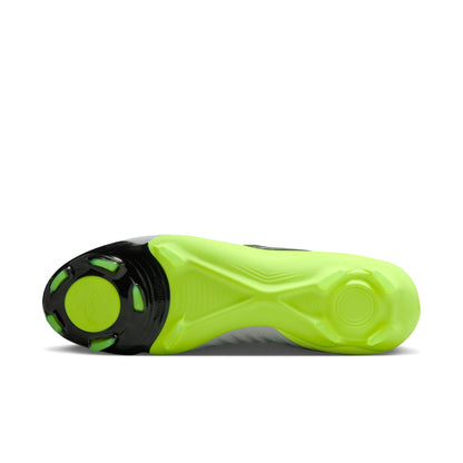 Close-up of a neon green and black shoe sole on a white background