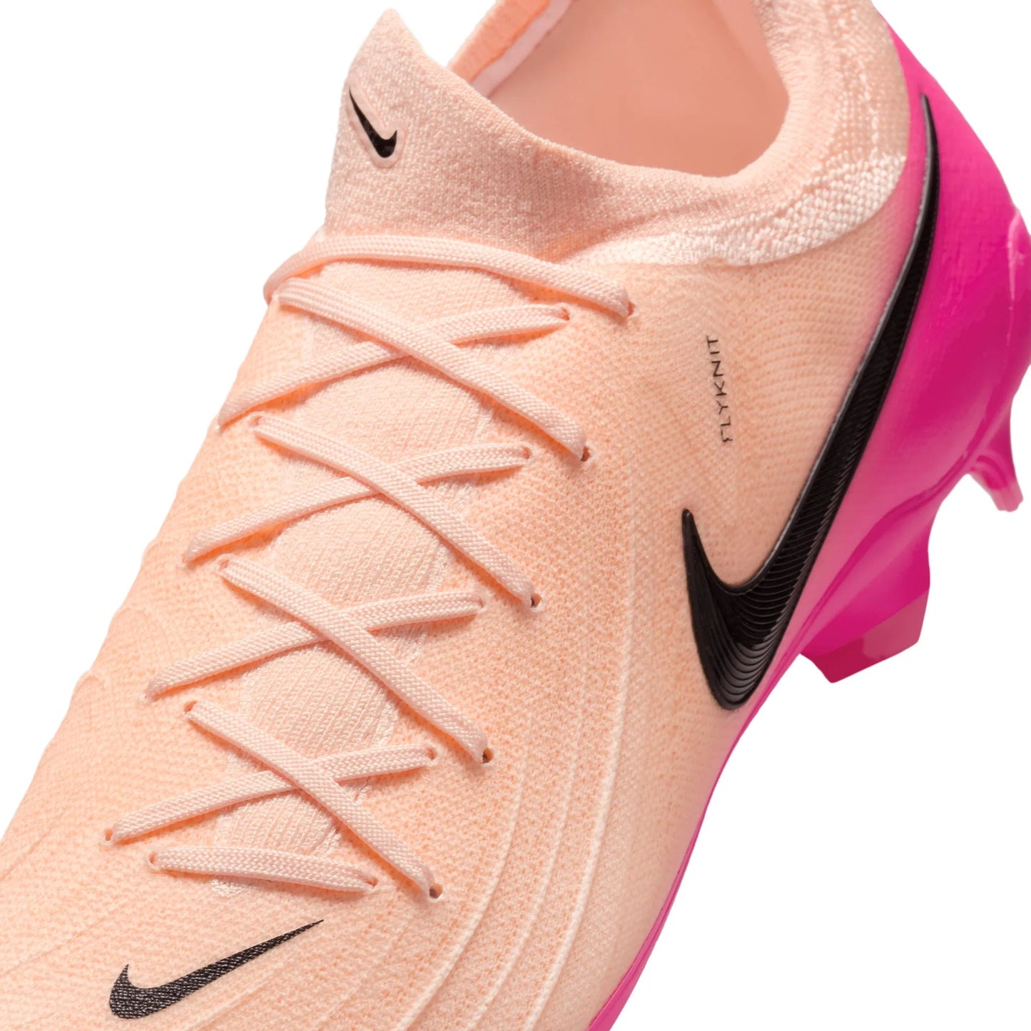 Pink and black sports shoe with Nike logo on a white background