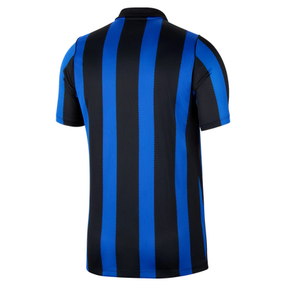 A short-sleeve soccer jersey shown from the back, featuring bold vertical stripes in black and bright royal blue, photographed on a clean white background.