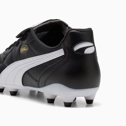 Black and white soccer cleats with a visible brand logo on a white background