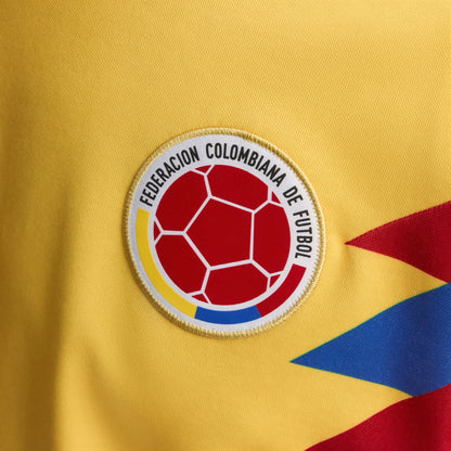 Colombian football Federation logo on a yellow background