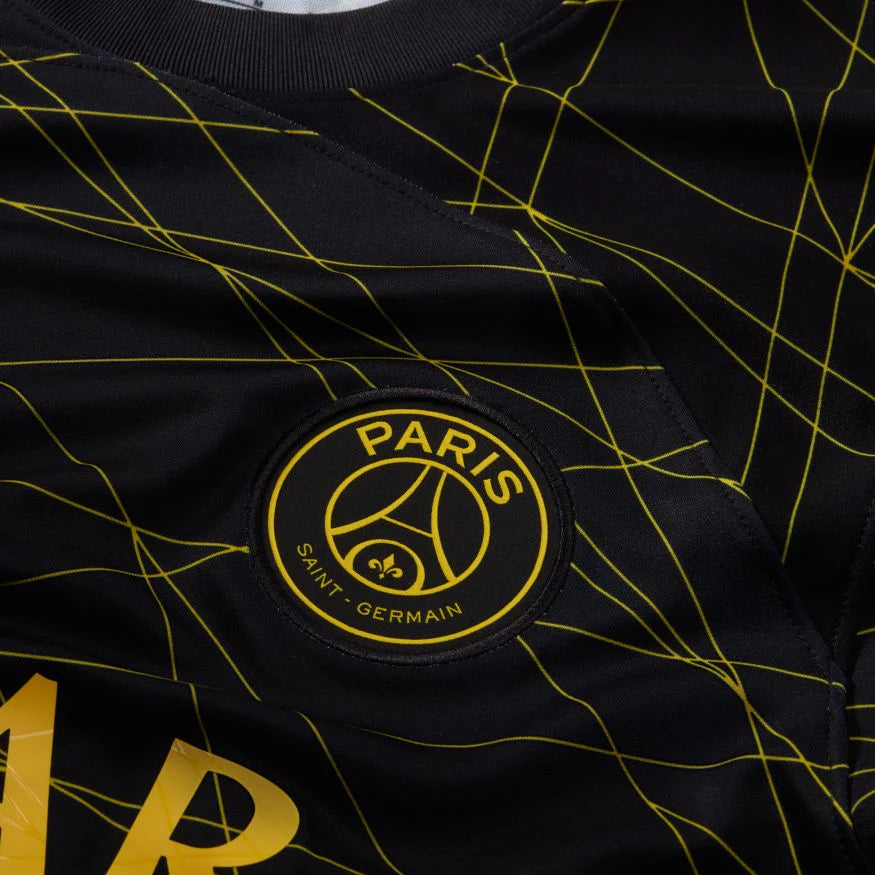 Black sports jersey with yellow geometric pattern and Paris Saint-Germain logo