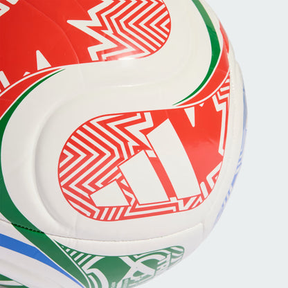 Close-up of a sports ball with red, white, and green patterns on a light gray background