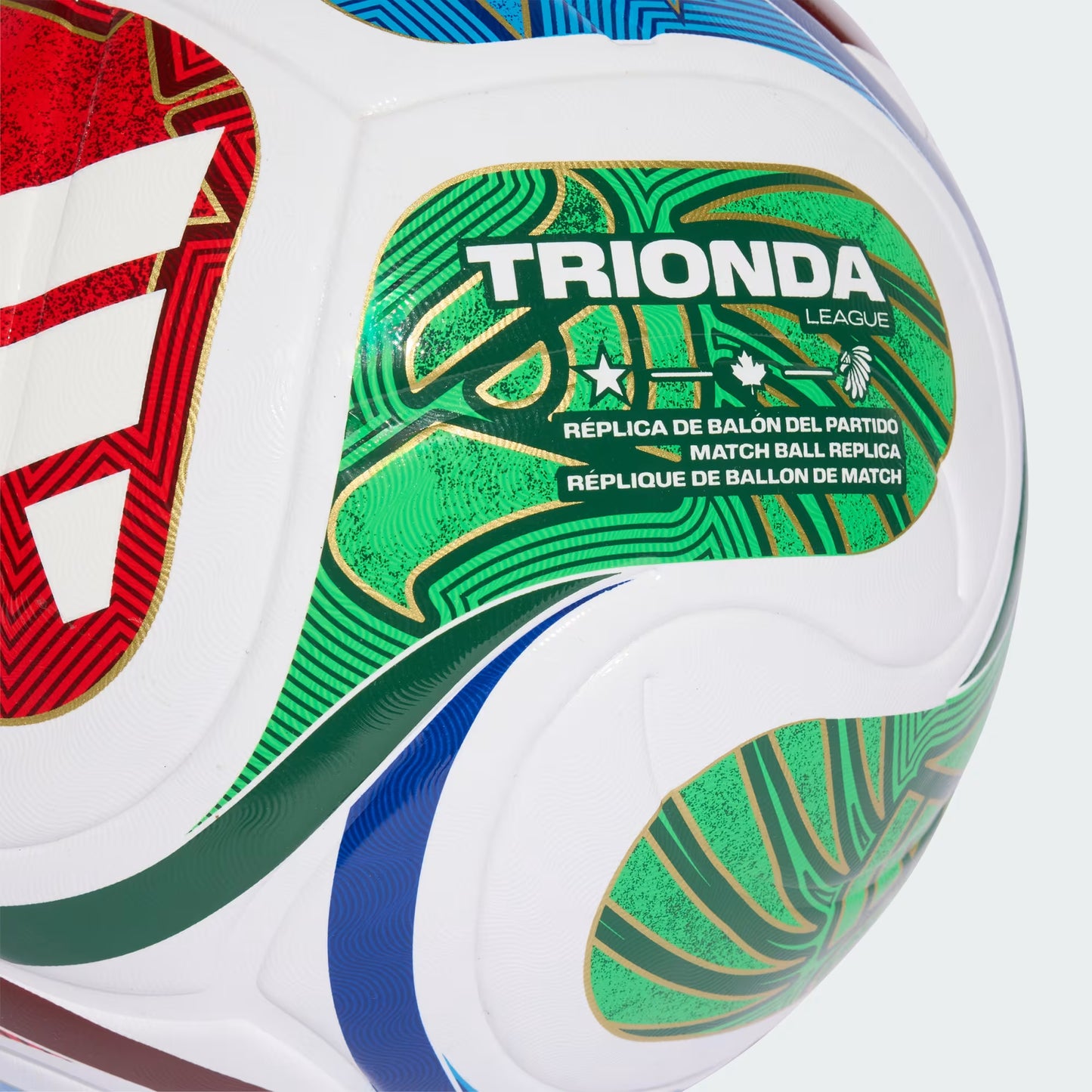 Close-up of a soccer ball with 'Trionda' branding on a white background