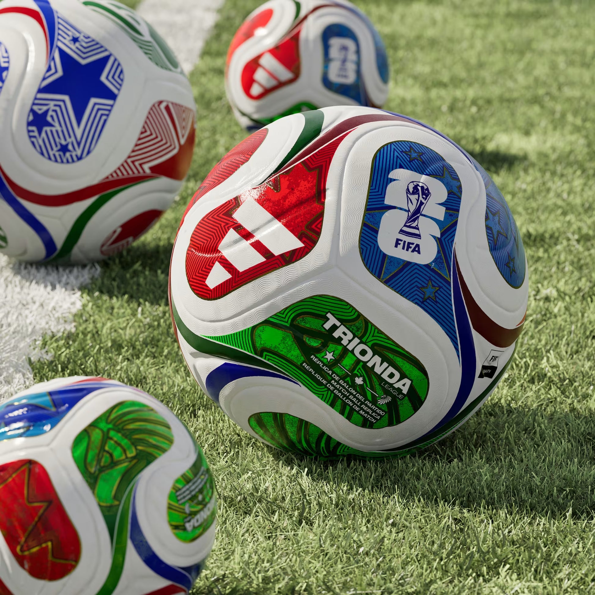 Colorful soccer balls with FIFA and Trionda branding on a grass field