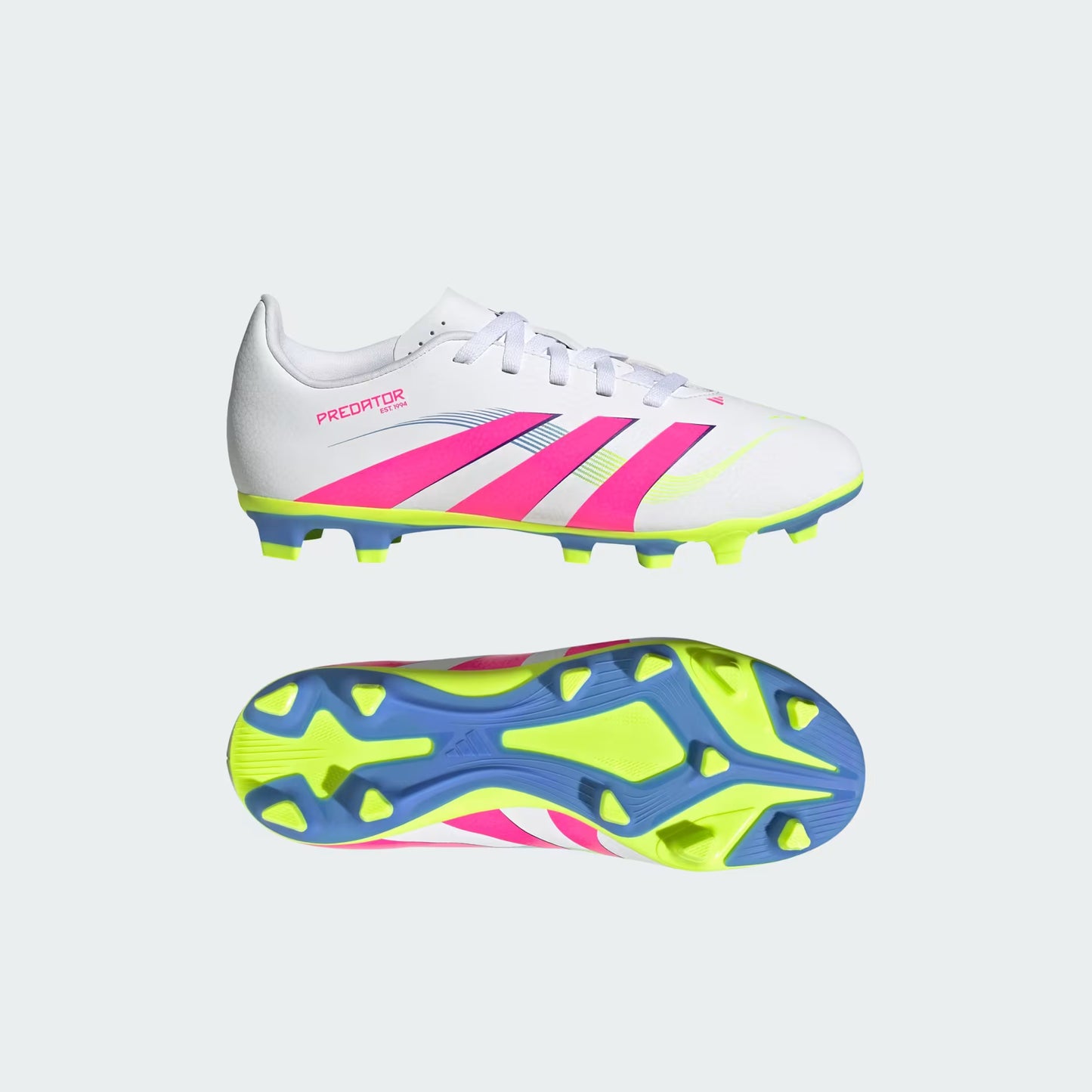 White soccer cleat with pink and blue accents on a light gray background