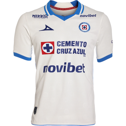 A white short-sleeve soccer jersey with blue and red accents, featuring the Cruz Azul club crest, sponsor logos like Cemento Cruz Azul and Novibet, and manufacturer branding by Nike.