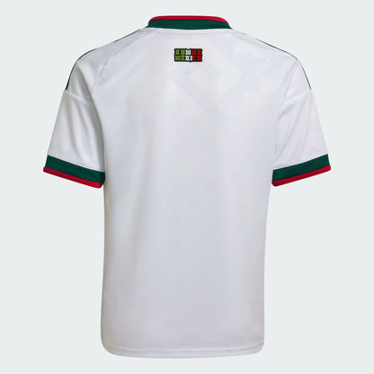 White sports jersey with green and red accents on a white background