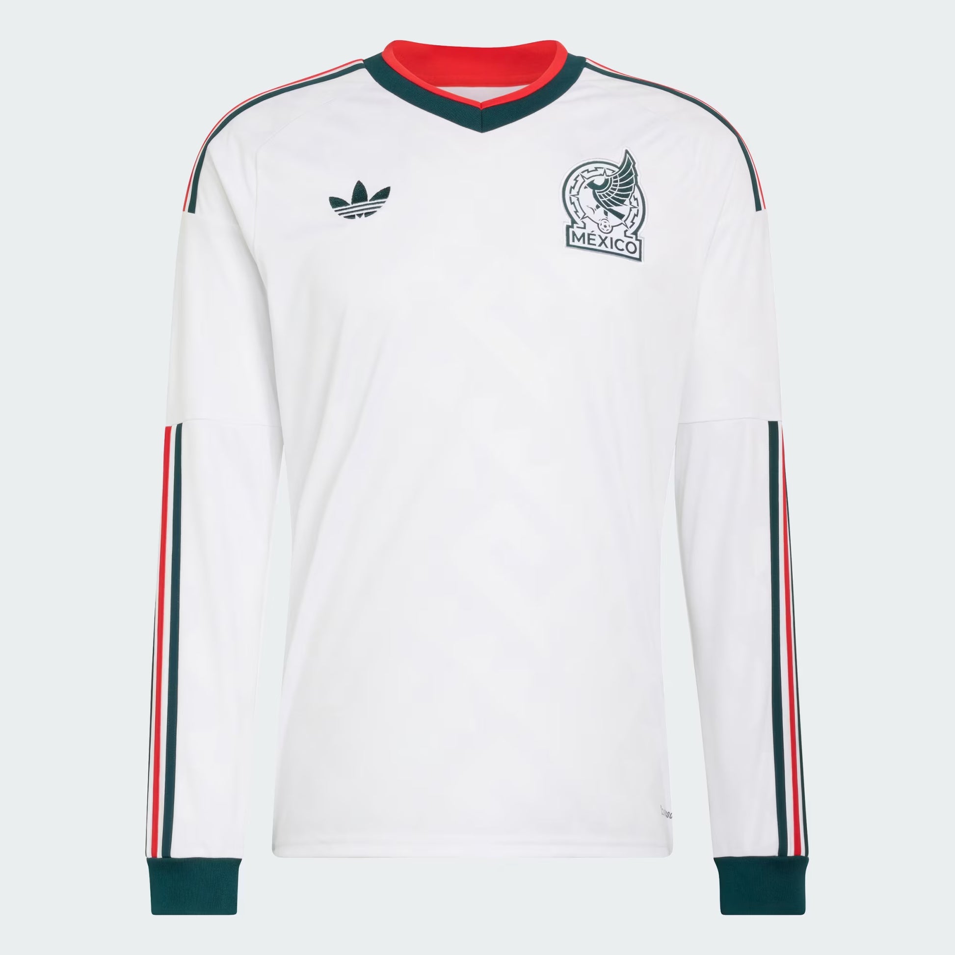 White long-sleeve shirt with red and green accents, featuring Adidas logo and Mexico emblem on a light gray background.