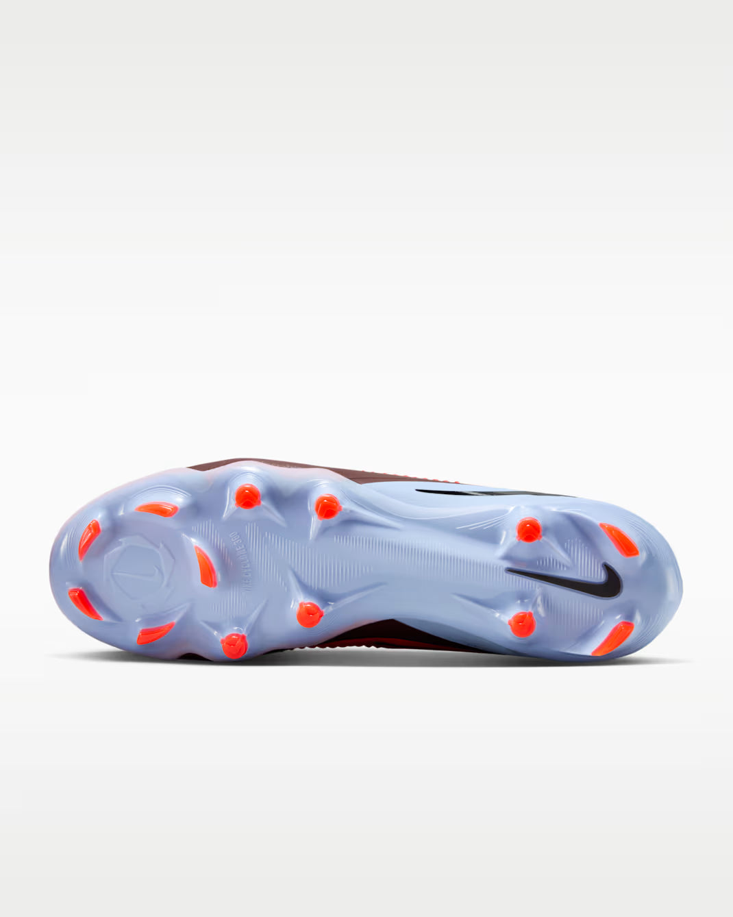 Sole of a sports shoe with brand logo on a white background