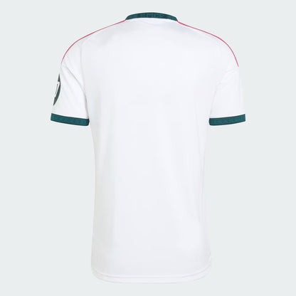 White sports jersey with green and red accents on a white background