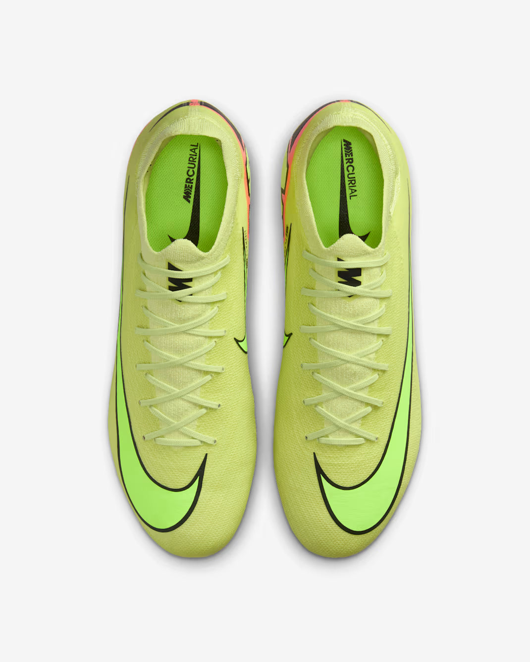 Pair of bright yellow soccer cleats with black swoosh logo on a light gray background