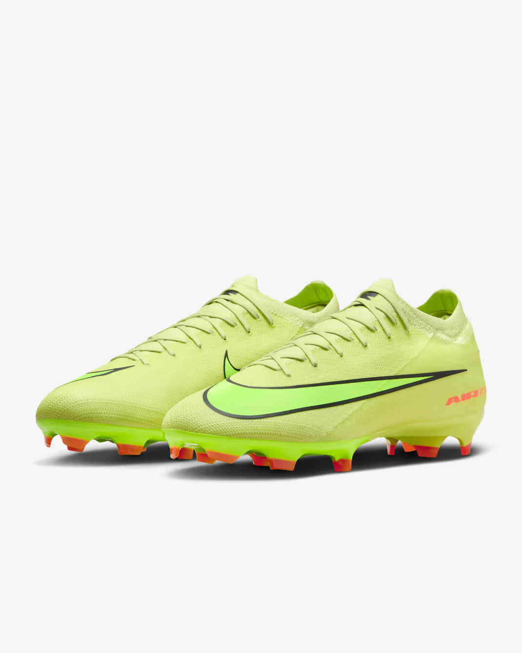 Bright yellow soccer cleats with black swoosh logo on a white background