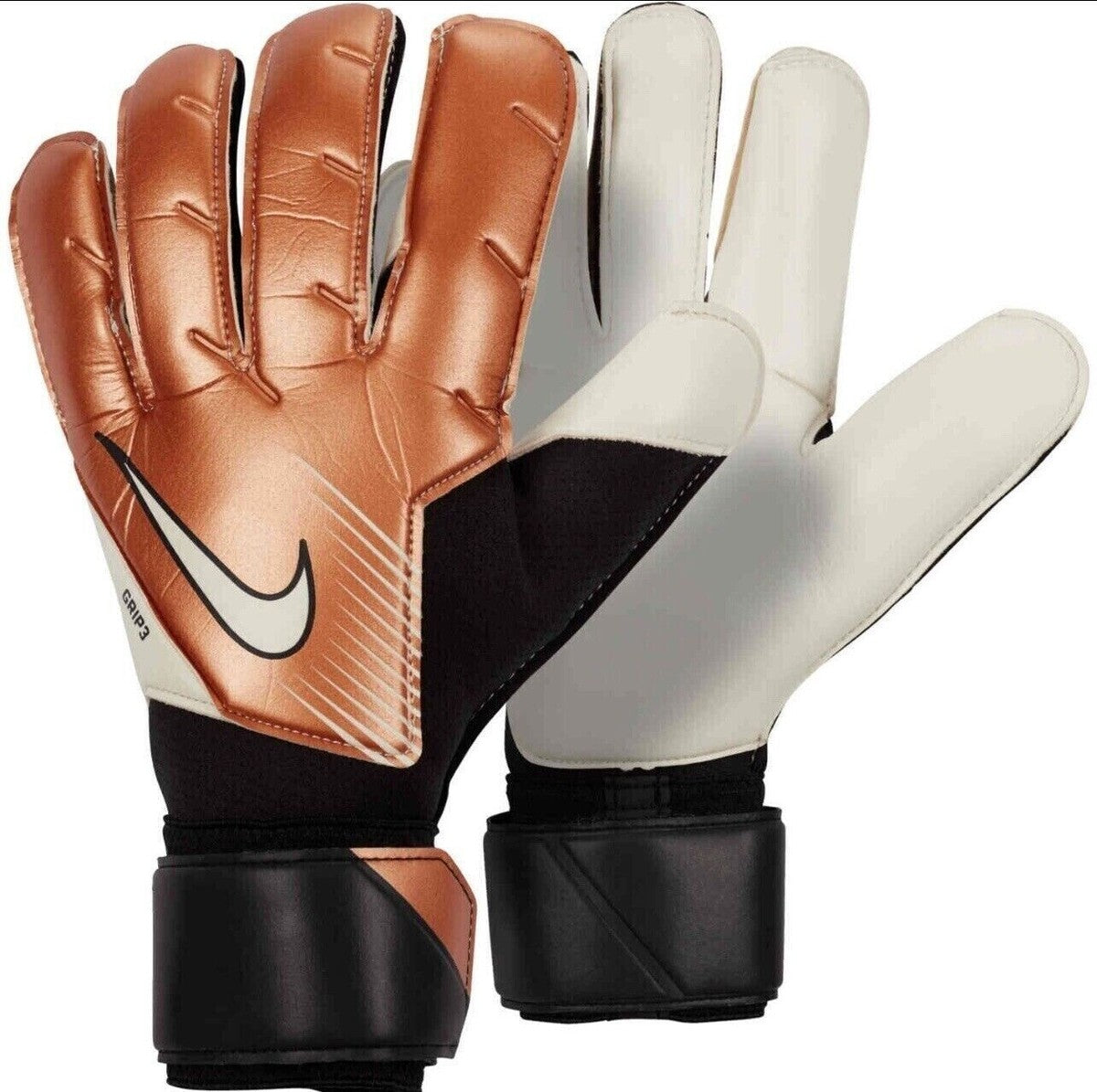 Pair of brown and white soccer gloves with Nike logo on a white background