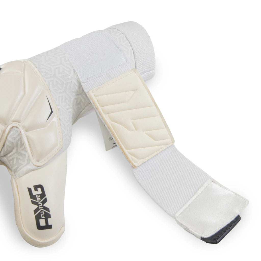 A pair of white and beige athletic shin guards with a black FXG logo, displayed on a clean white background.